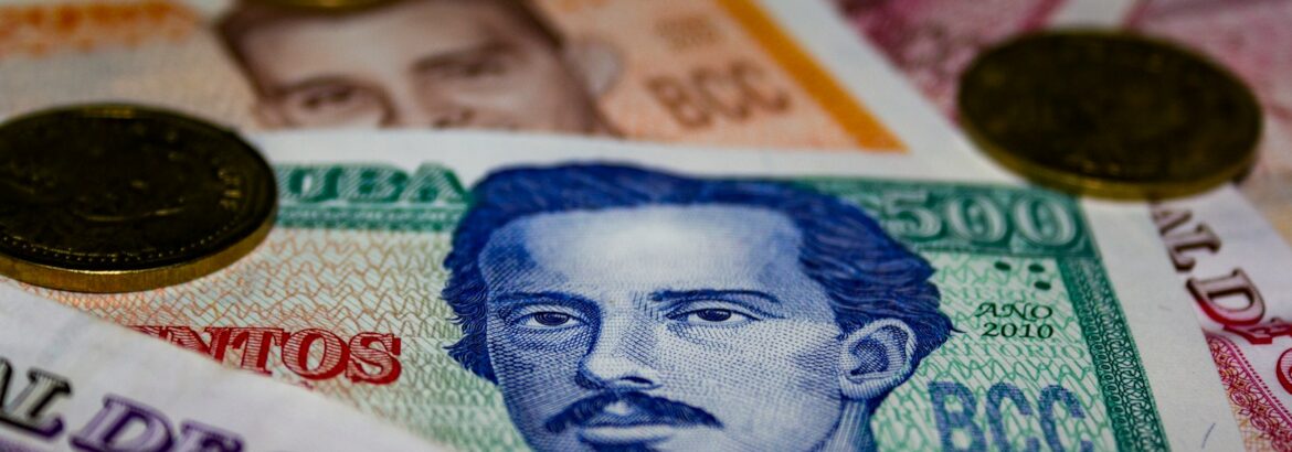 20 banknote on white and blue textile